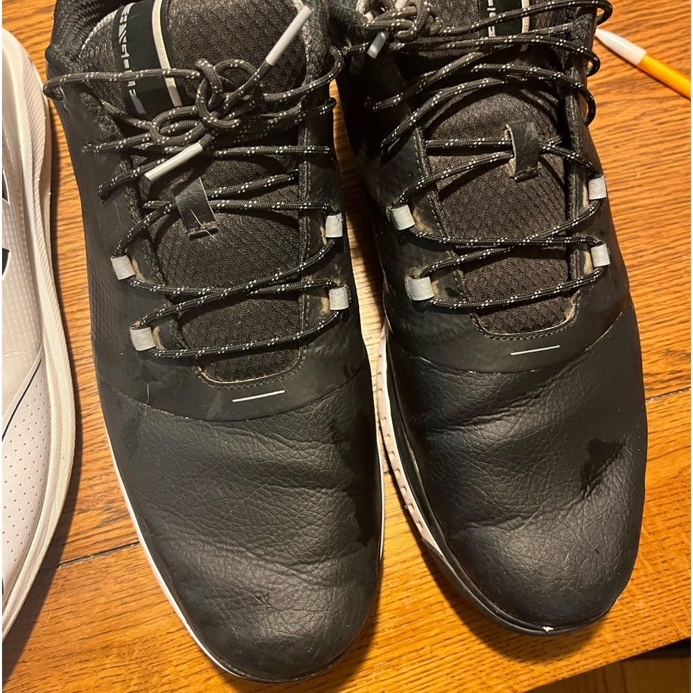 Size 12 Under Armour golf shoes.